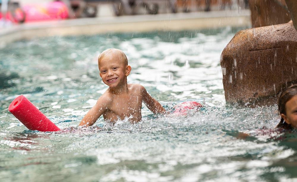 kids playing in the caribbean resort pool